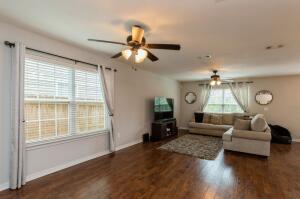 218 Wainwright Drive Crestview, FL 32539 - Photo 5 of 42 a living room with furniture and a large window