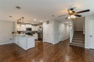 218 Wainwright Drive Crestview, FL 32539 - Photo 9 of 42 a view of kitchen with refrigerator and window