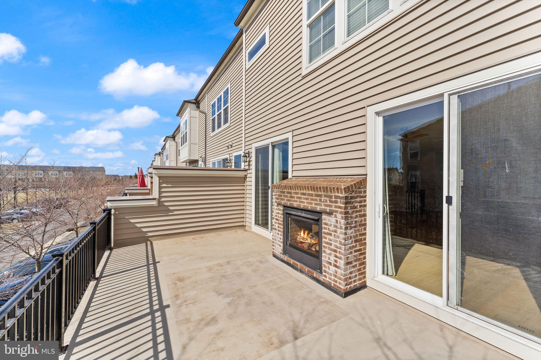 42295 Riggins Ridge Terrace Brambleton, VA 20148 - Photo 55 of 69 With dual fronted fire place