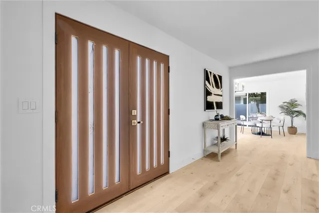 a view of a livingroom with furniture and window