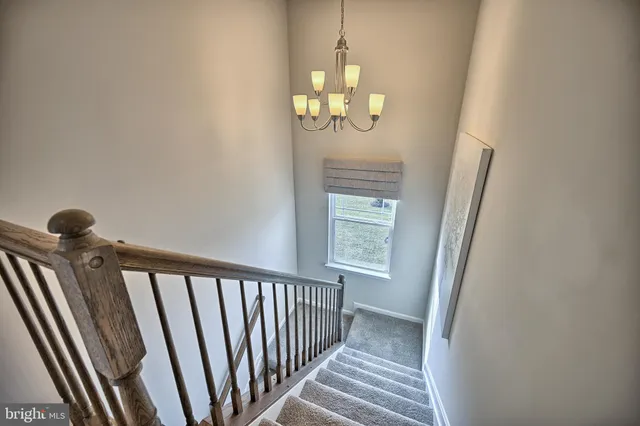 a view of a hallway with windows
