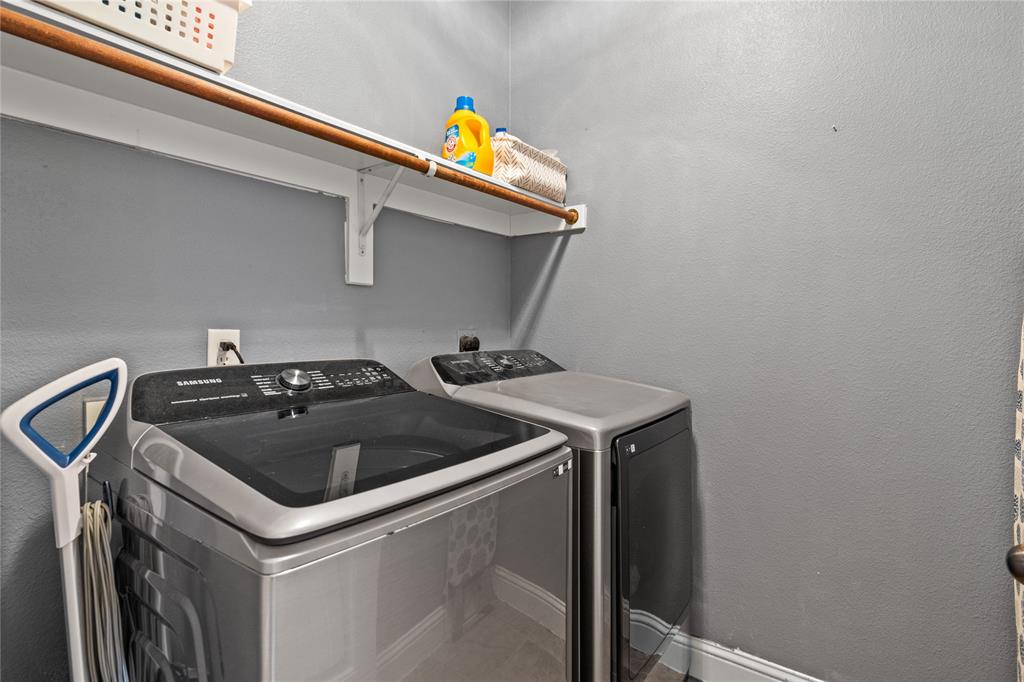 517 Austin Acre Road Sulphur Springs, TX 75482 - Photo 17 of 36 a utility room with dryer and washer