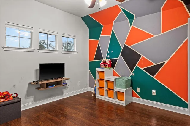 a room with musical instruments and air hockey table