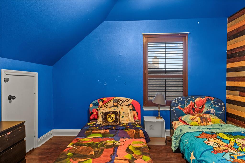 517 Austin Acre Road Sulphur Springs, TX 75482 - Photo 30 of 36 a bedroom with two beds and a window