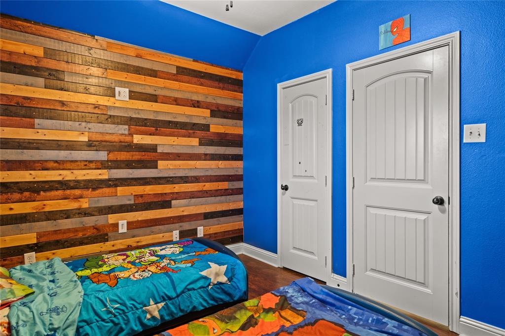 517 Austin Acre Road Sulphur Springs, TX 75482 - Photo 31 of 36 a bed room with a bed and a window