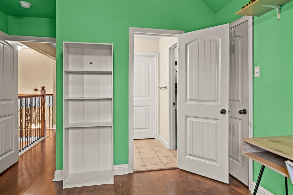 517 Austin Acre Road Sulphur Springs, TX 75482 - Photo 33 of 36 a view of a kitchen with wooden floor and a kitchen