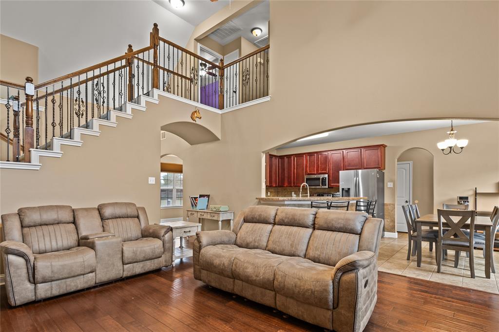 517 Austin Acre Road Sulphur Springs, TX 75482 - Photo 7 of 36 a living room with furniture and a table