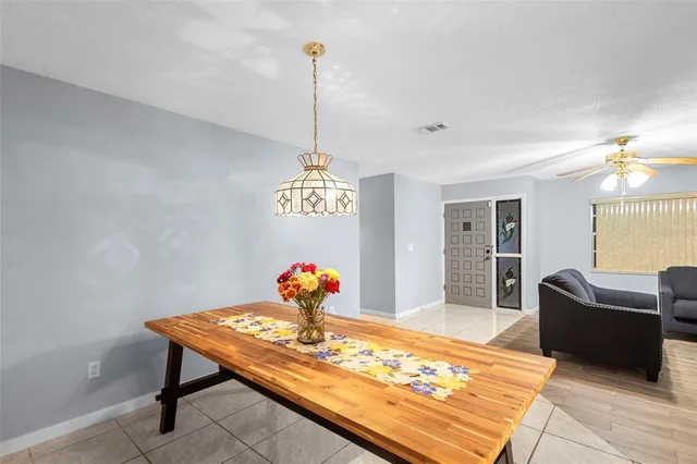 a view of a livingroom with furniture and window