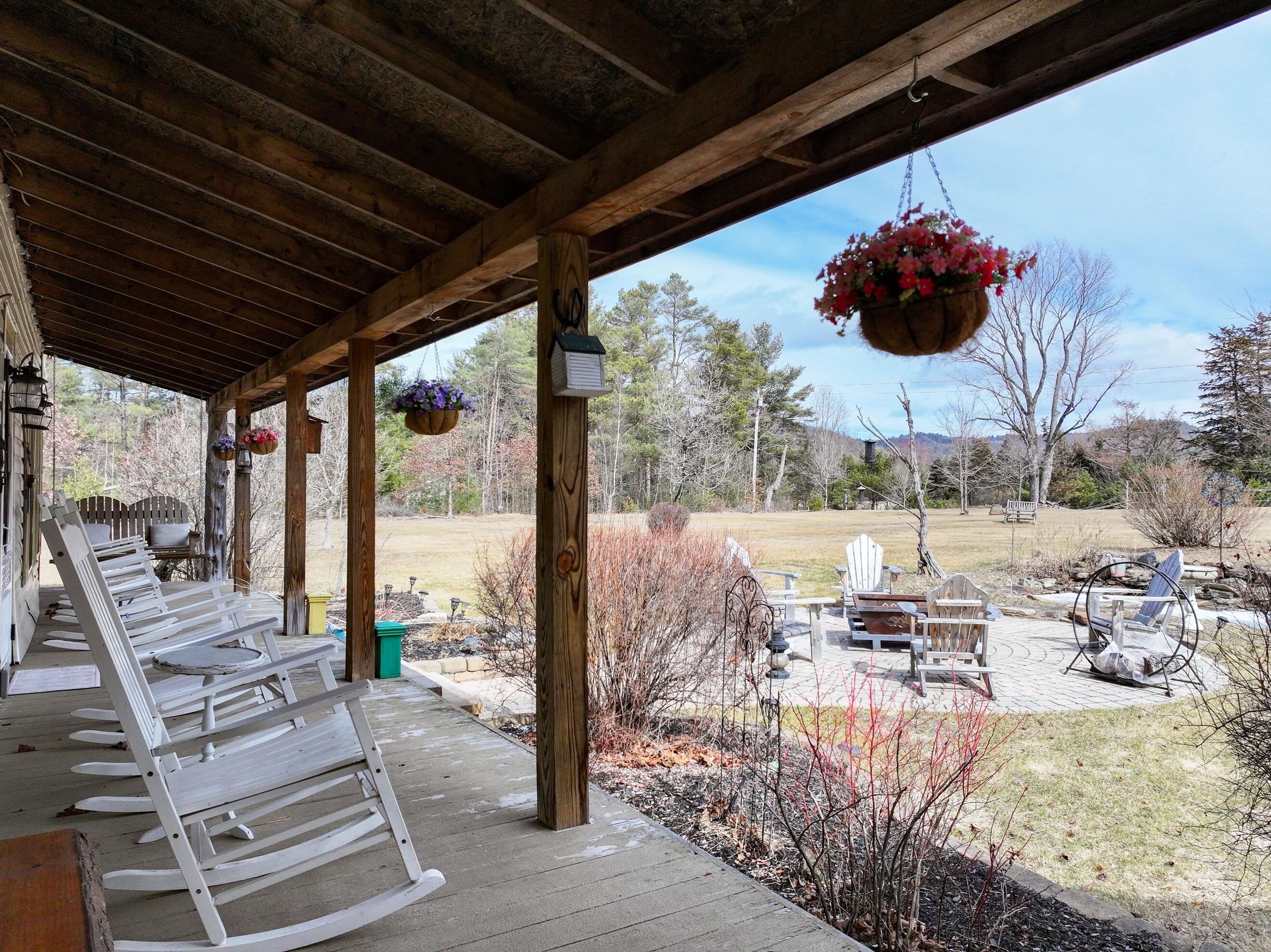 1167 Trout Pond Road Keeseville, NY 12944 - Photo 57 of 74 Front Porch Seating Area