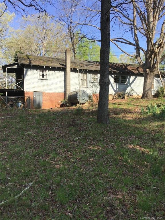 1030 Highway 64 Rutherfordton, NC 28139 - Photo 4 of 16 a view of a yard with porch