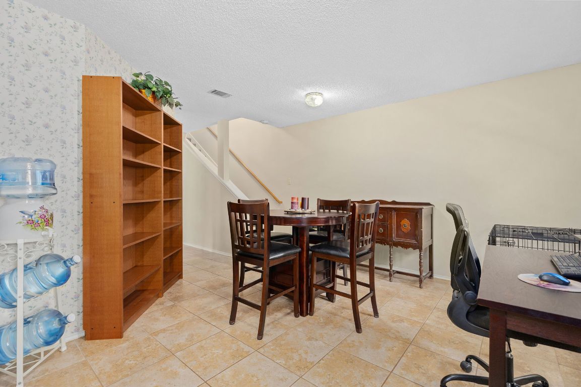 2158 Redwing Way Round Rock, TX 78664 - Photo 11 of 25 a view of a workspace with furniture