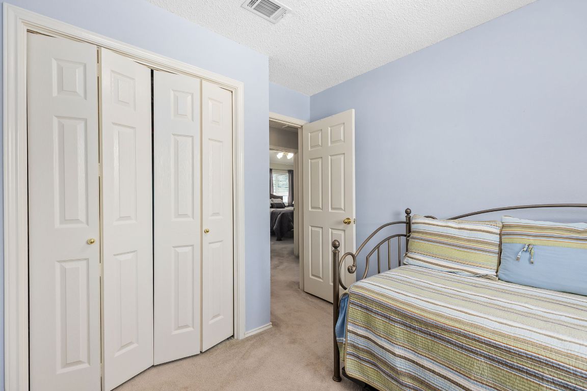 2158 Redwing Way Round Rock, TX 78664 - Photo 15 of 25 a bedroom with a sink and a window