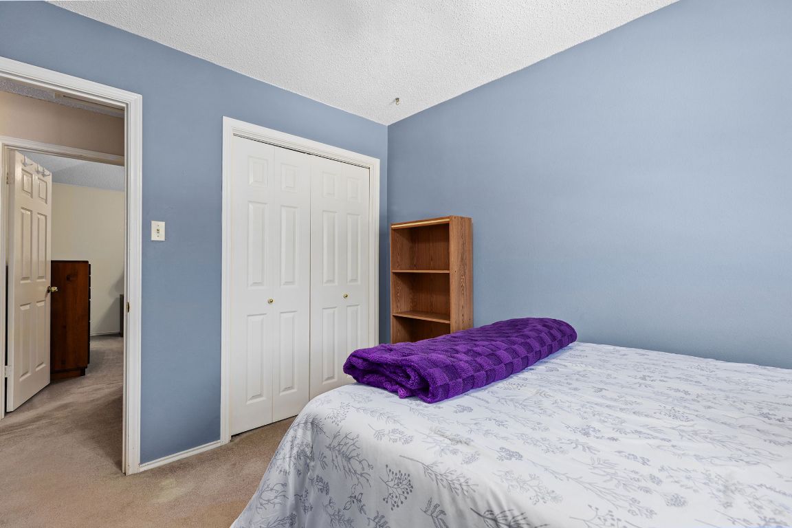 2158 Redwing Way Round Rock, TX 78664 - Photo 17 of 25 a bedroom with a bed and a closet