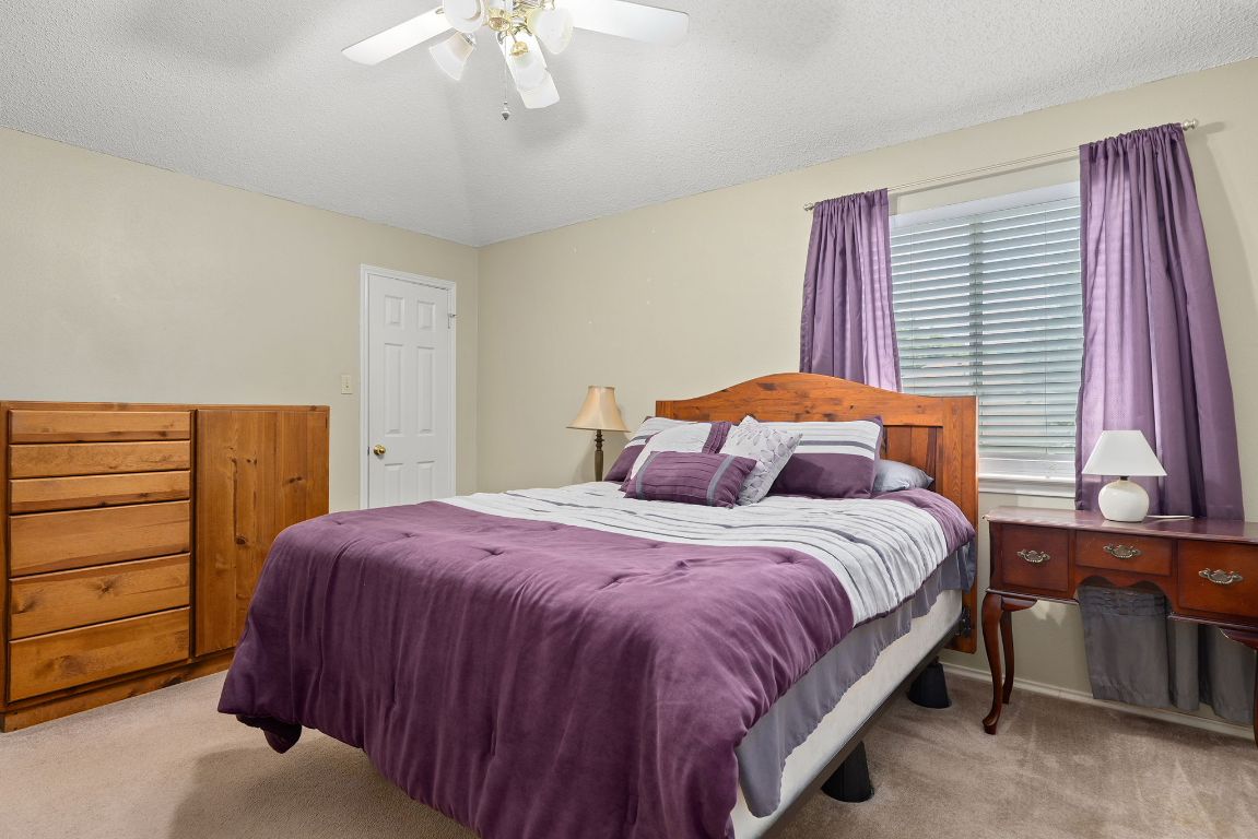 2158 Redwing Way Round Rock, TX 78664 - Photo 20 of 25 a bedroom with a bed and a window