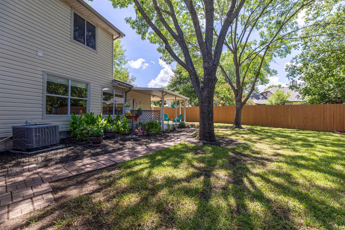 2158 Redwing Way Round Rock, TX 78664 - Photo 25 of 25 a view of a house with backyard and tree