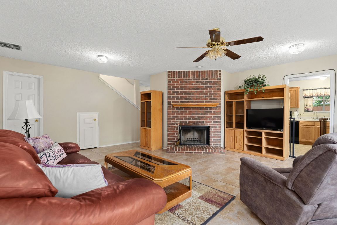 2158 Redwing Way Round Rock, TX 78664 - Photo 4 of 25 a bed room with furniture and a flat screen tv