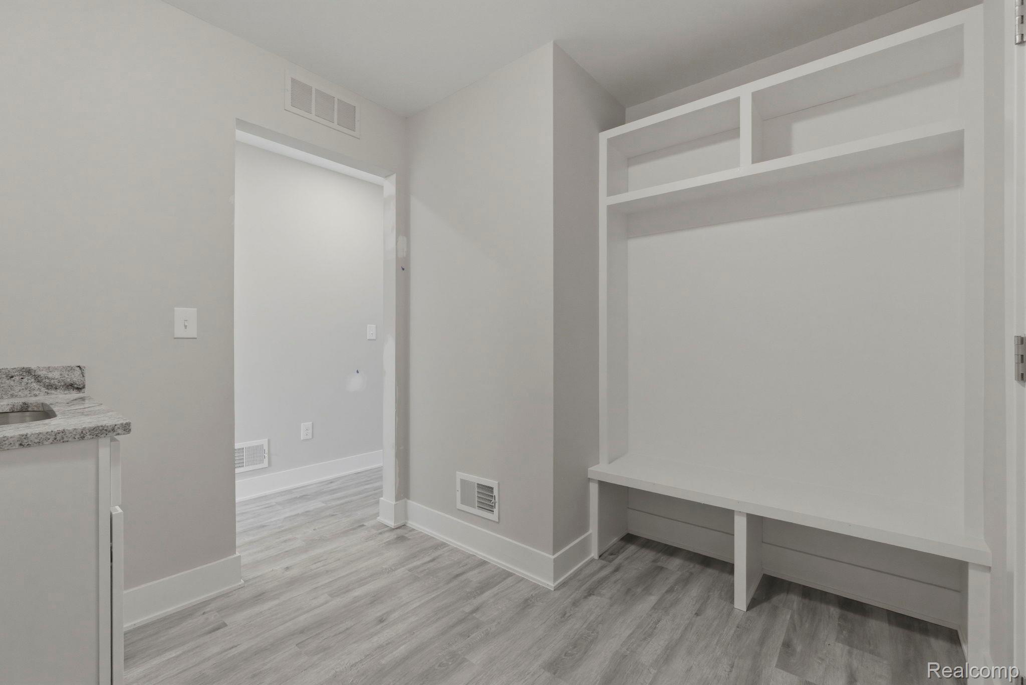 2281 Baltimore Davison, MI 48423 - Photo 20 of 26 Mudroom with baseboards and light wood-style flooring
