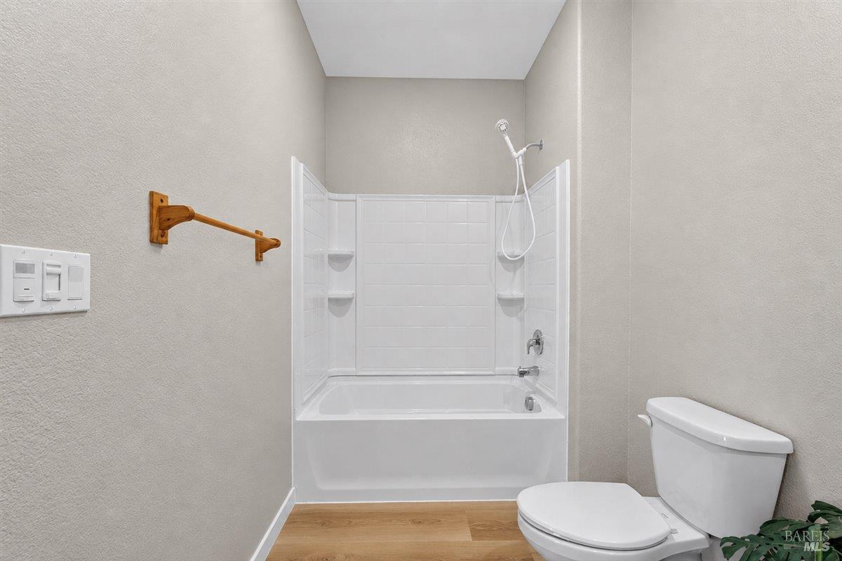 2275 Revival Lane Rio Vista, CA 94571 - Photo 20 of 31 a bathroom with a toilet and a shower