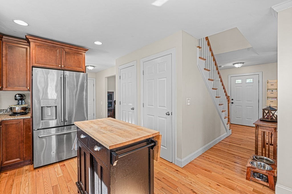10 Caitlin Road Salisbury, MA 01952 - Photo 12 of 33 a kitchen with a refrigerator and a sink