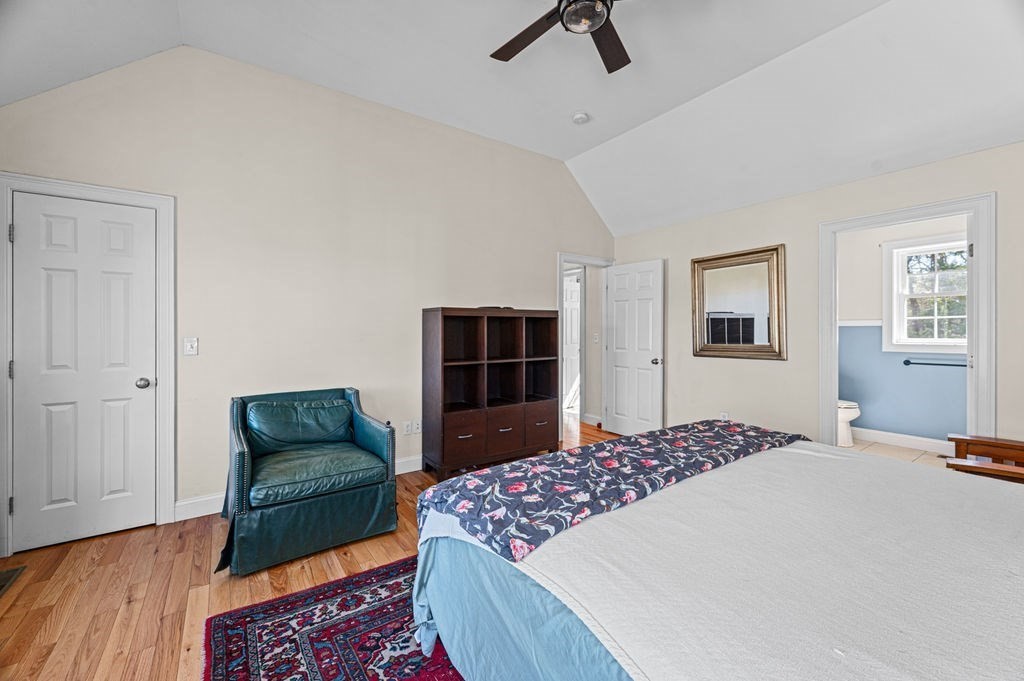 10 Caitlin Road Salisbury, MA 01952 - Photo 22 of 33 a bedroom with a bed and a couch