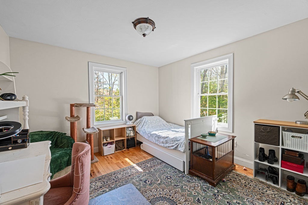10 Caitlin Road Salisbury, MA 01952 - Photo 26 of 33 a bed room with furniture and a window