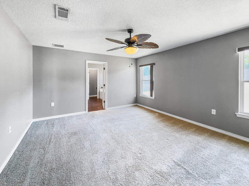 125 Lillian Way Crestview, FL 32536 - Photo 11 of 33 a view of an empty room with a window