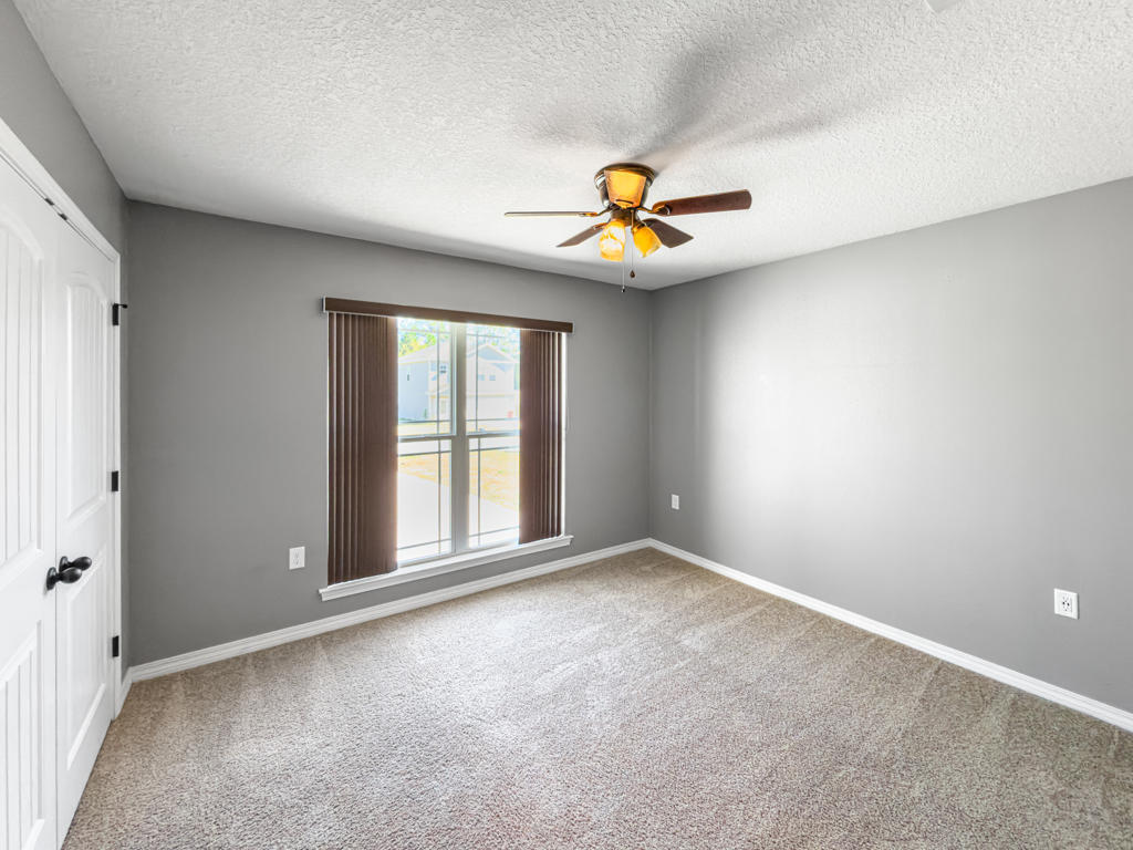 125 Lillian Way Crestview, FL 32536 - Photo 15 of 33 a view of an empty room with a window