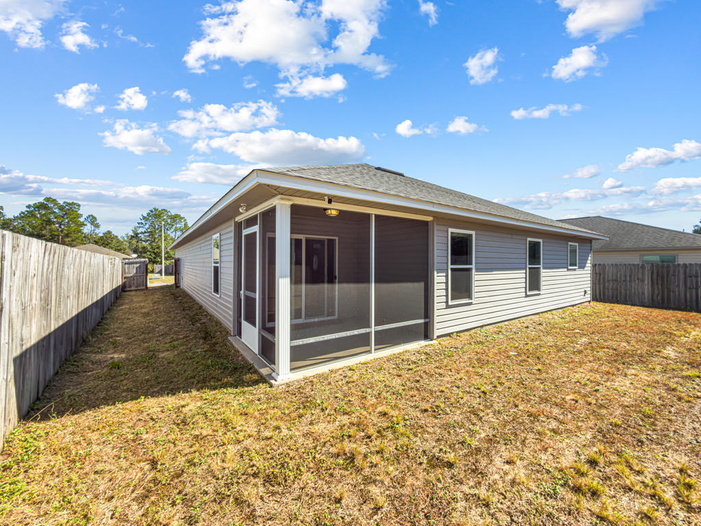 125 Lillian Way Crestview, FL 32536 - Photo 27 of 33 a view of a house with a yard