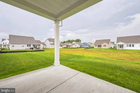 a view of swimming pool and garden