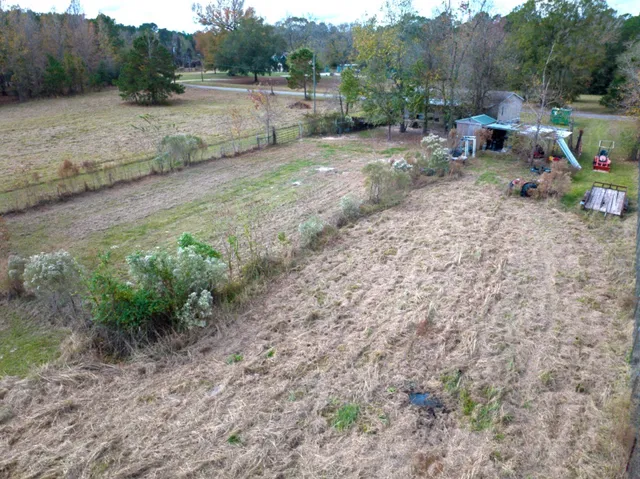 a view of backyard with outdoor space