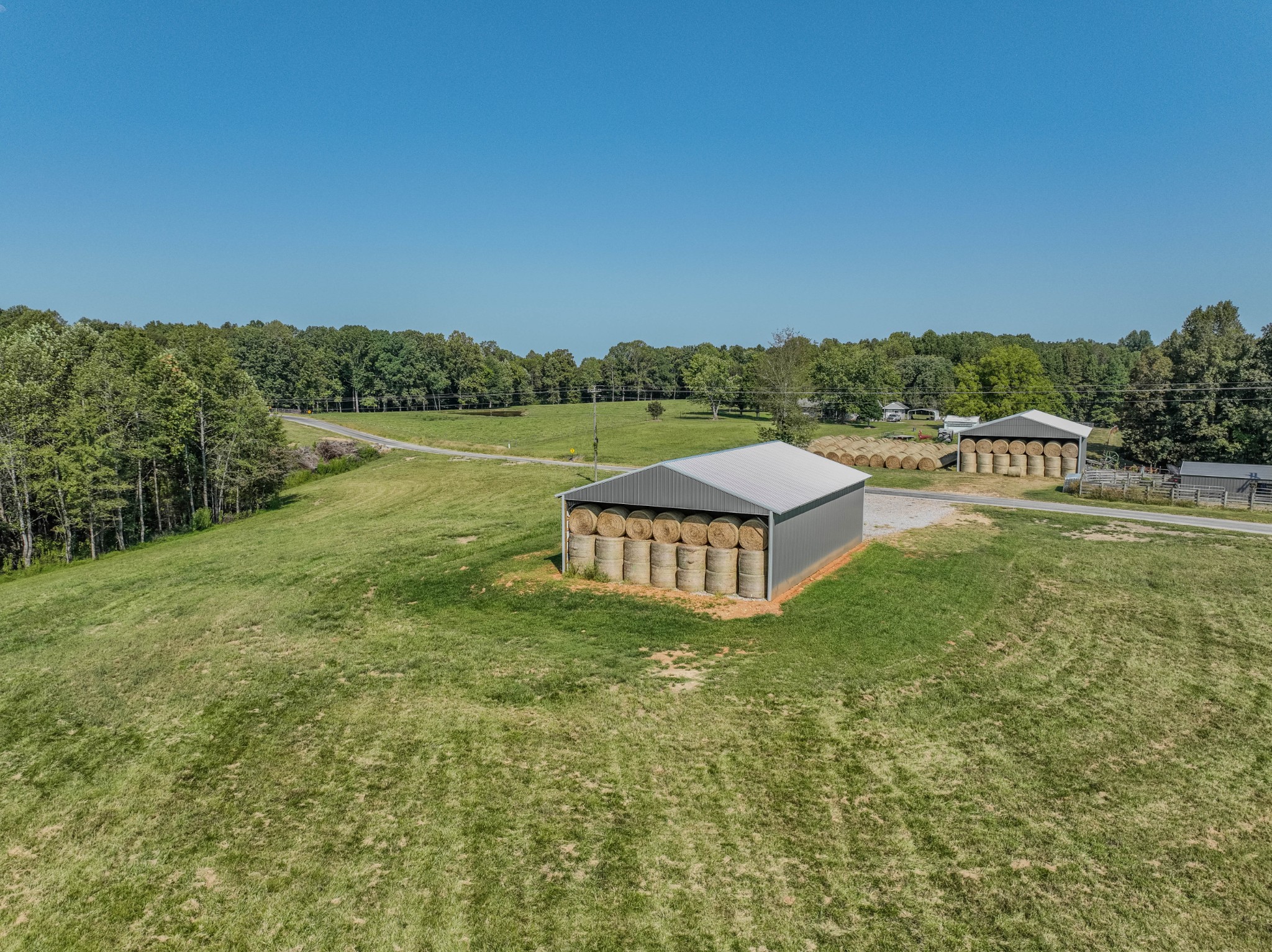 373 Mayfield Road Pulaski, TN 38478 - Photo 11 of 17 a view of a lake with couches in the back yard