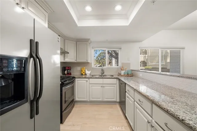 $739,000 | 4561 Warner Avenue, Unit 101, Huntington Beach, CA 92649