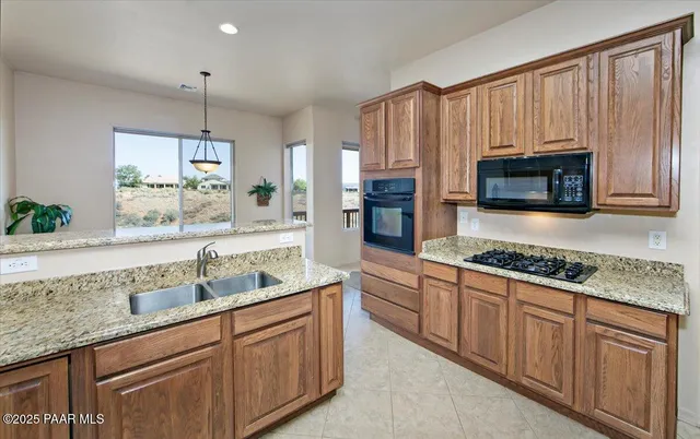 an aerial view of a house with a ocean view