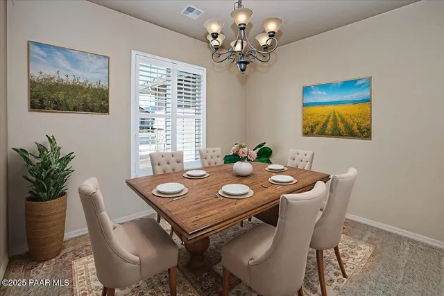 a kitchen with stainless steel appliances granite countertop a refrigerator stove top oven and sink