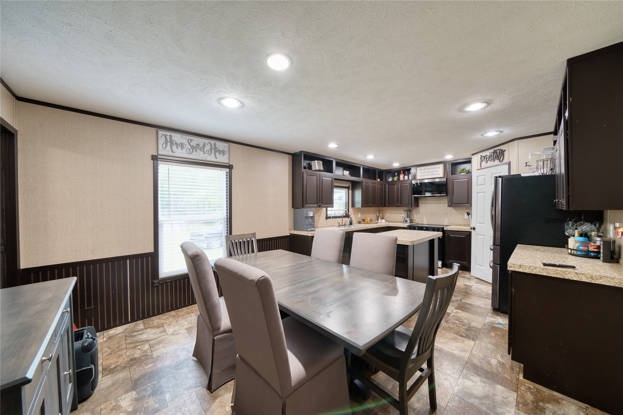 103 County Road 370 Splendora, TX 77372 - Photo 11 of 32 a view of a dining room with furniture