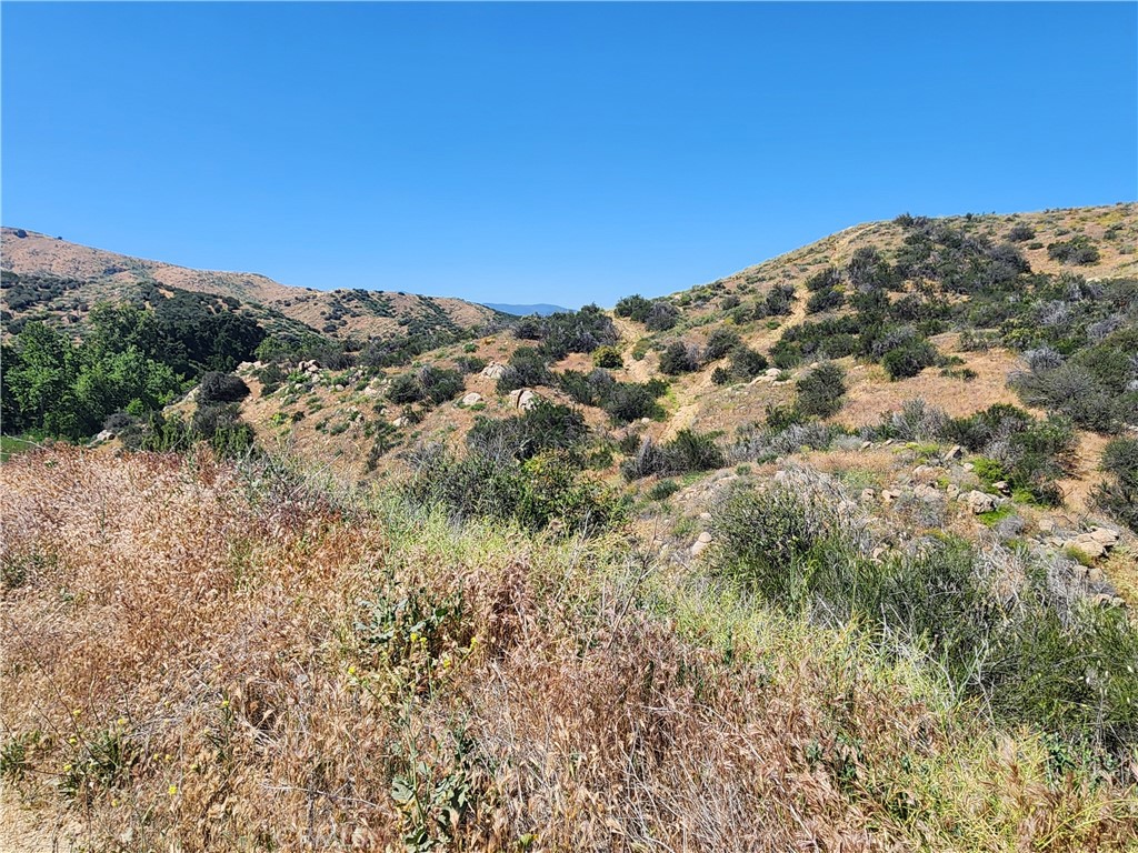 0 Dawson Canyon Road Corona, CA 92883 - Photo 17 of 20 a view of a large building with mountains in the background