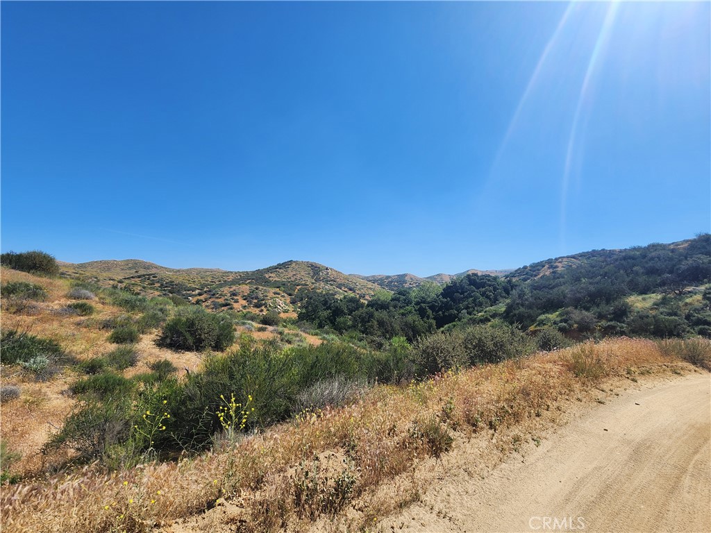 0 Dawson Canyon Road Corona, CA 92883 - Photo 20 of 20 a view of a lake with mountains in the background