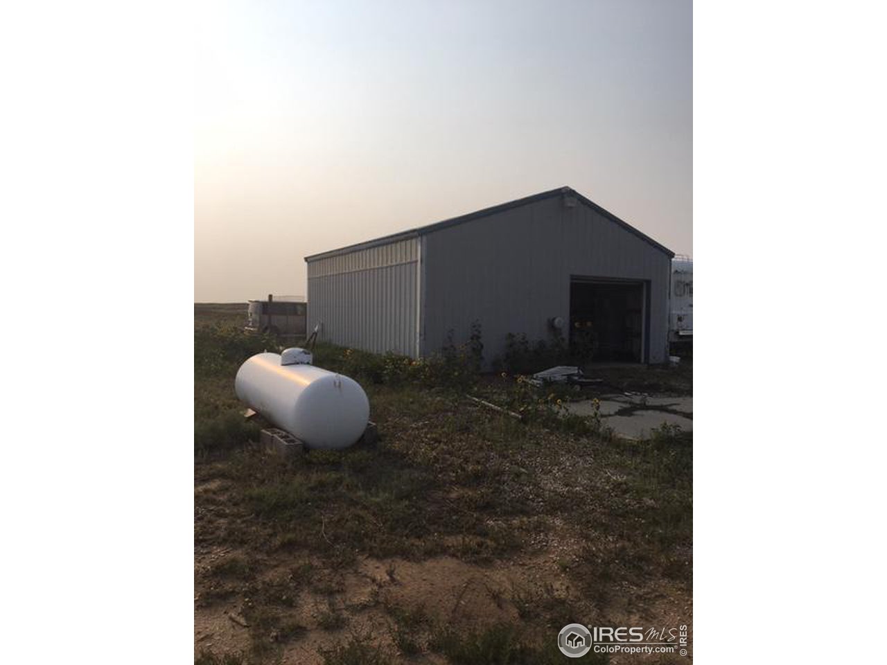 1460 Johnson Road North Rush, CO 80833 - Photo 14 of 22 Detached Garage with Propane, Elect, HVAC, Secure