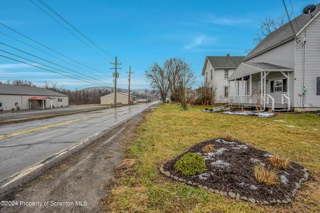 a view of a house with a swimming pool