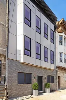 a building with a window and balcony