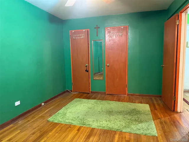 a view of a room with window and stairs