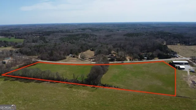 a view of a garden with an outdoor space