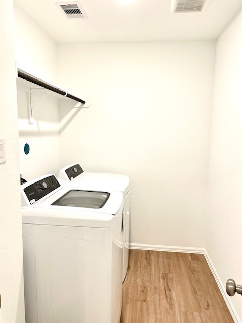 18646 Gravago Lane New Caney, TX 77357 - Photo 11 of 21 a utility room with dryer and washer