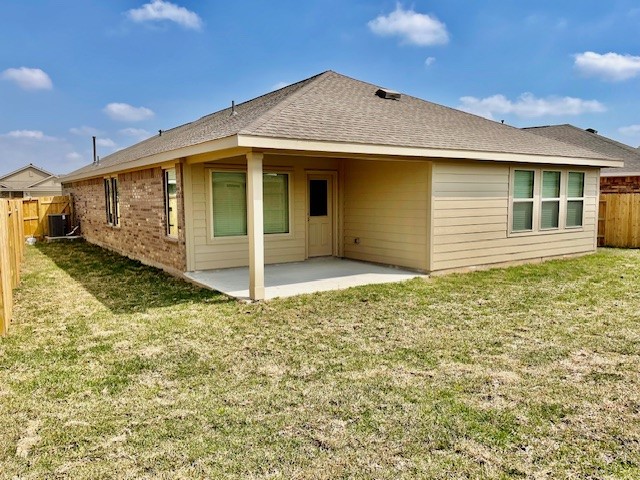 18646 Gravago Lane New Caney, TX 77357 - Photo 19 of 21 a front view of a house with a garden