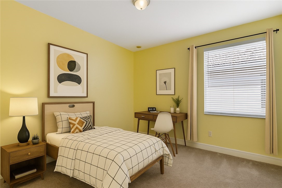 1923 Grey Falcon Circle Southwest Vero Beach, FL 32962 - Photo 20 of 36 a bedroom with a bed and wooden floor