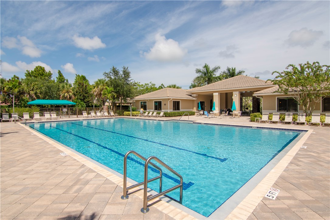 1923 Grey Falcon Circle Southwest Vero Beach, FL 32962 - Photo 30 of 36 a view of swimming pool with chairs