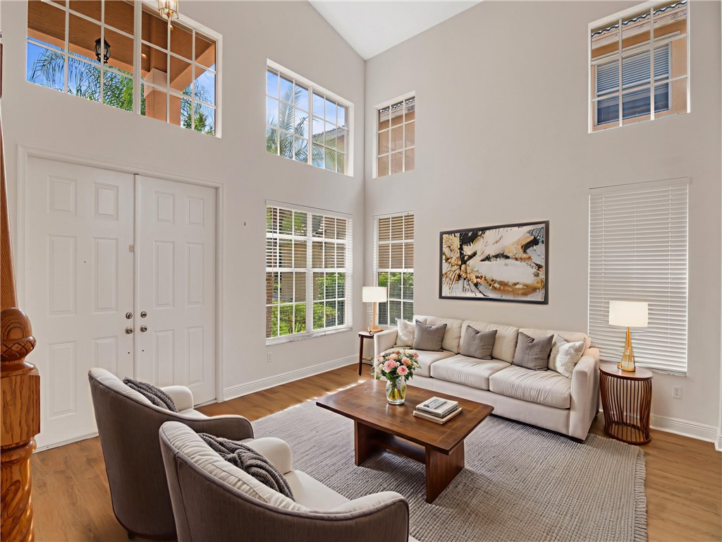 1923 Grey Falcon Circle Southwest Vero Beach, FL 32962 - Photo 6 of 36 a living room with furniture and a window