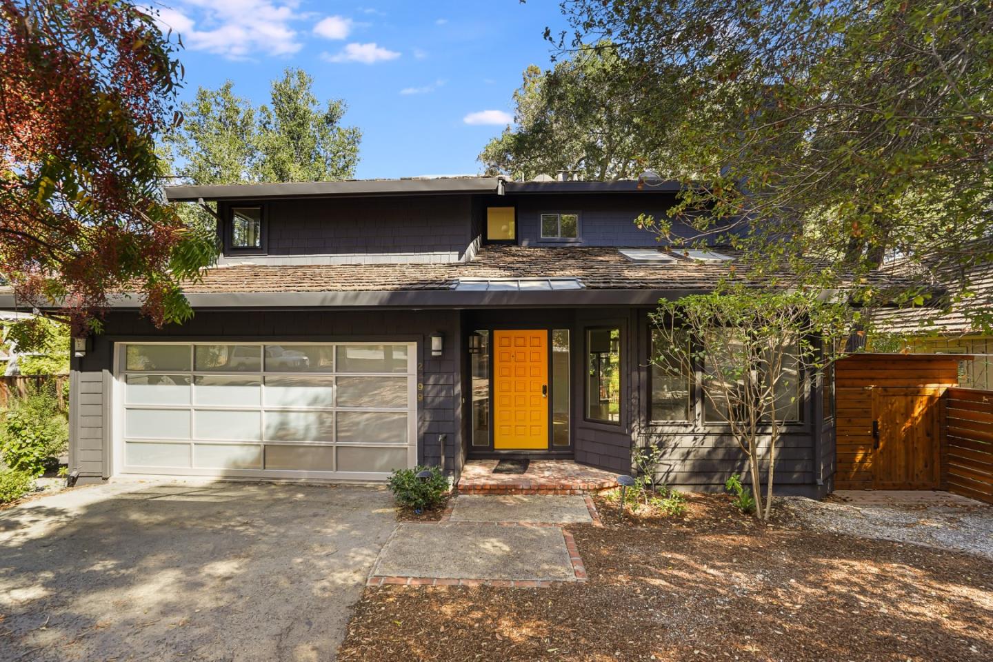 2499 Alpine Road Menlo Park, CA 94025 - Photo 1 of 53 a front view of a house with a garage