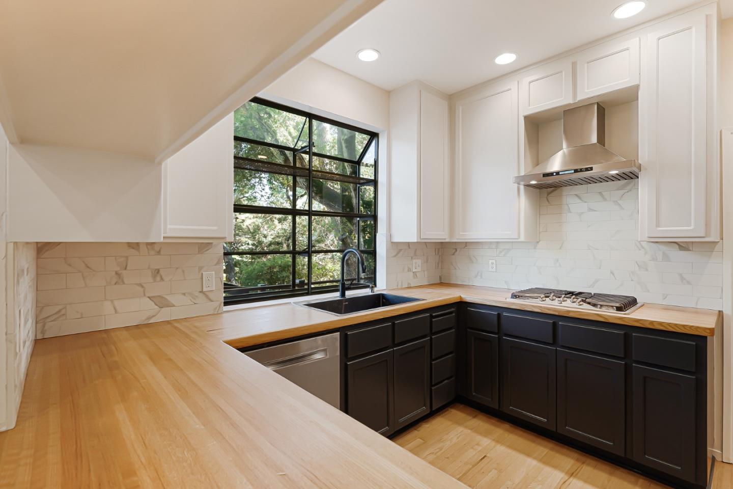 2499 Alpine Road Menlo Park, CA 94025 - Photo 11 of 53 a kitchen with a sink a window and cabinets