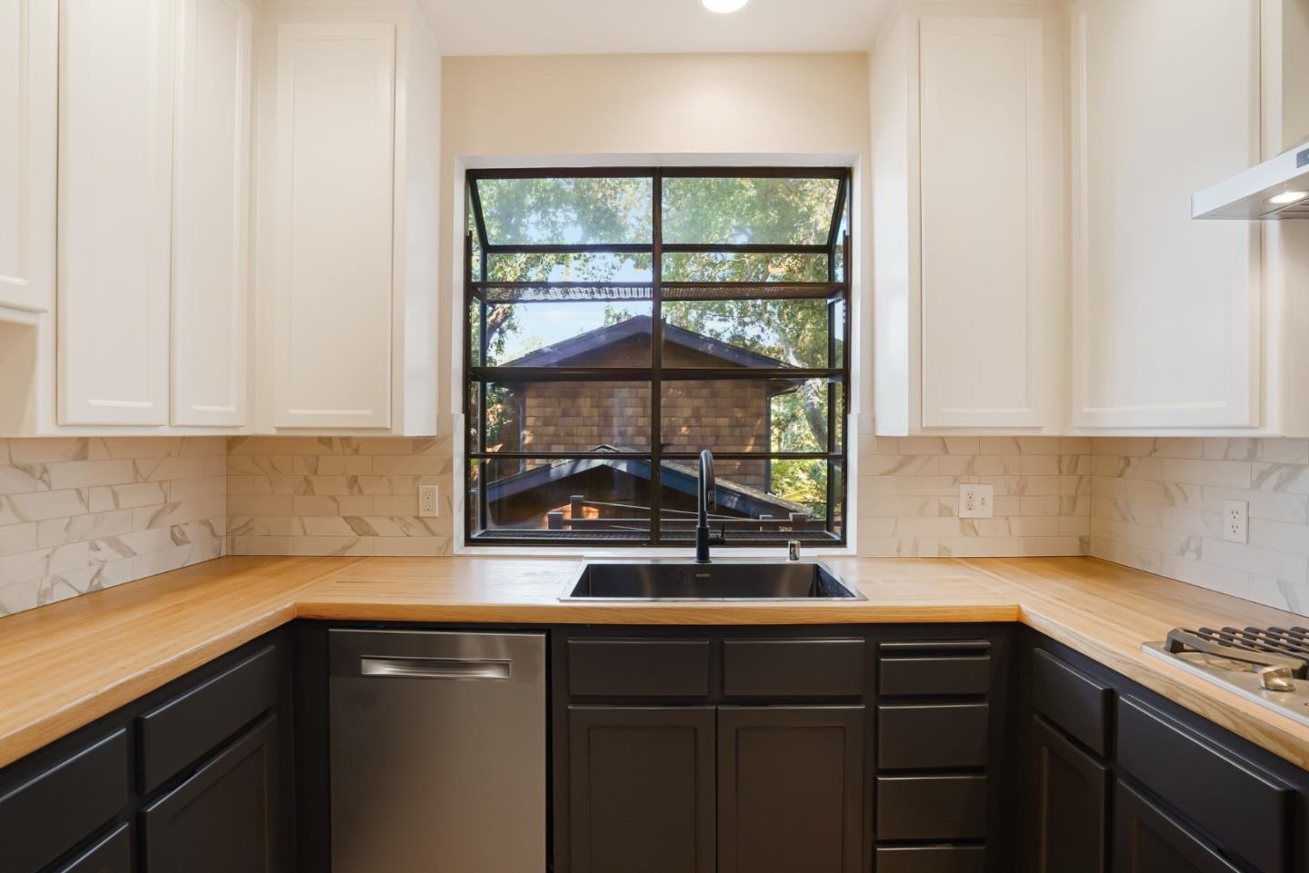 2499 Alpine Road Menlo Park, CA 94025 - Photo 13 of 53 a kitchen with a sink and cabinets